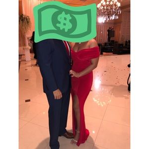 Off the shoulder Red evening gown with slit.